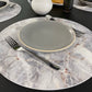 MR-MGRIS: Mantel individual redondo PVC Mármol gris
