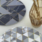 MR-GEOGRIS: Mantel individual redondo PVC Geométrico gris